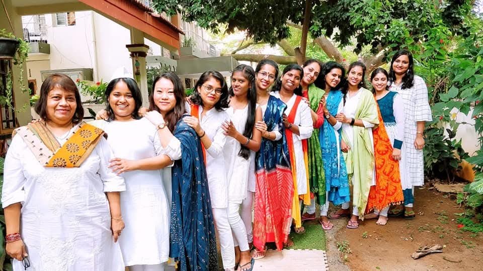 The Astitva team gathered outdoors together